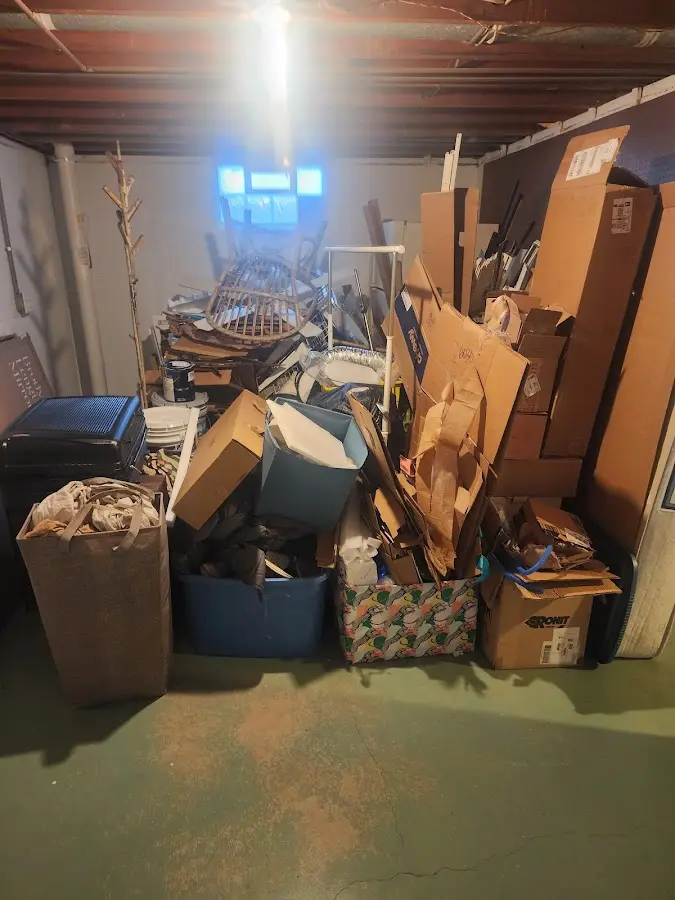 Roll-off dumpster container at job site for 4 Yard Dumpster Rental in Newcastle